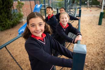 st-fidelis-coburg-primary-school-students-2 Students in playground at St Fidelis Coburg Primary School